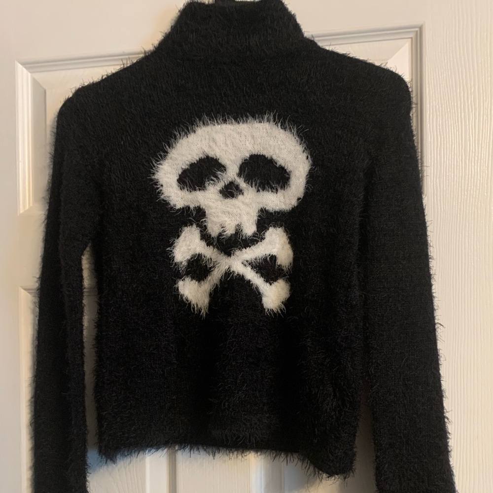 fuzzy skull turtleneck sweater